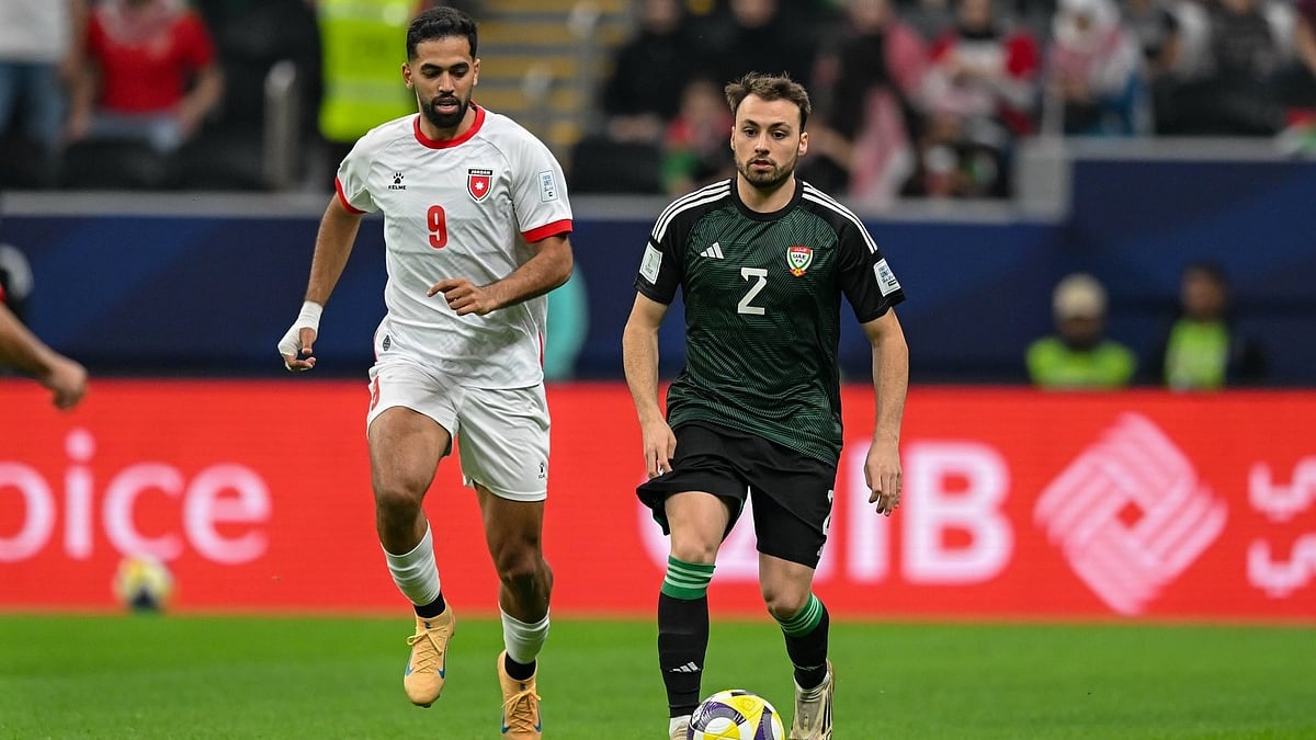 | Photo: Instagram/uaefa : United Arab Emirates' Ruben Amaral is chased by Jordan's Ali Olwan during the FIFA Arab Cup 2025 match on December 3, 2025.