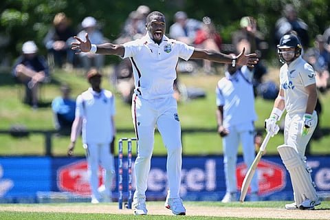 West Indies' bowler Jayden Seales appeals unsuccessfully for a LBW decision on New Zealand's Tom Latham, right, on day 3 during their cricket test match in Christchurch, New Zealand.