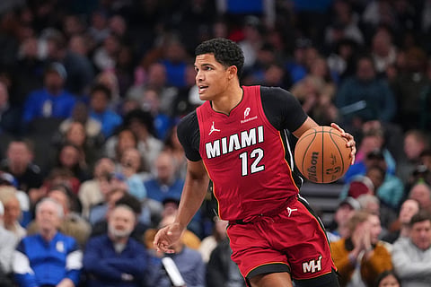Miami Heat guard Dru Smith dribbles the ball against the Dallas Mavericks during the second half of an NBA basketball game in Dallas.