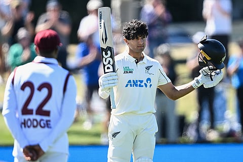 New Zealand's Rachin Ravindra celebrates after making 100 runs against the West Indies on day 3 during their cricket test match in Christchurch, New Zealand.