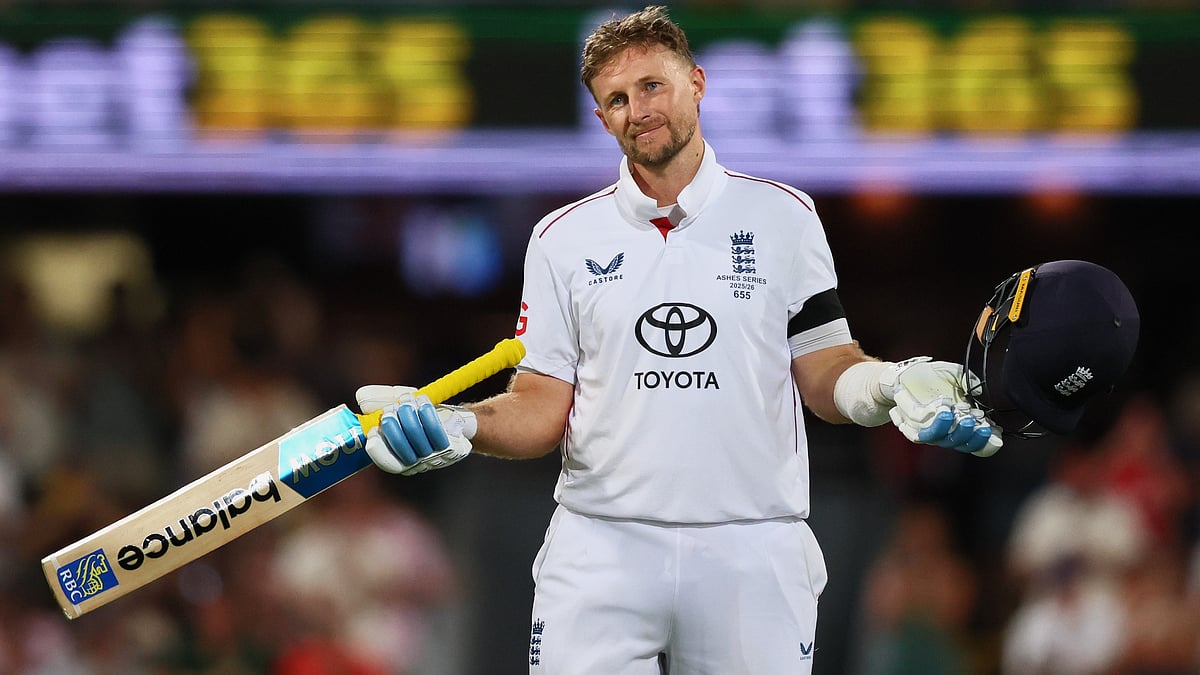 AP Photo/Tertius Pickard : England's Joe Root celebrates his century during the second Ashes cricket test match between Australia and England in Brisbane, Thursday, Dec. 4, 2025.