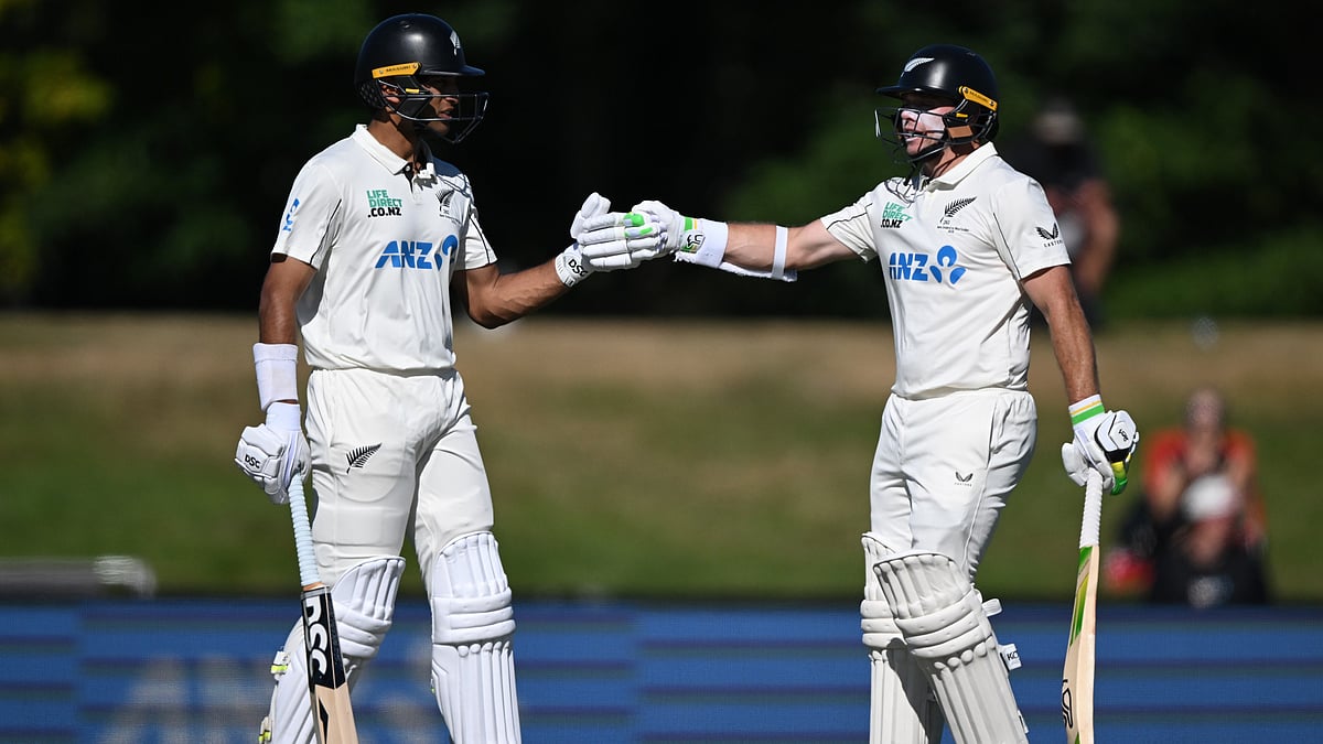 | Photo: AP/Andrew Cornaga                                           : New Zealand's batters Rachin Ravindra and Tom Latham encourage each other while batting against the West Indies on day 3 during their cricket test match in Christchurch, New Zealand, Thursday, Dec. 4, 2025. 