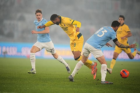Lazio's Alessio Romagnoli tackles AC Milan's Ruben Loftus-Cheek during the Italian Cup round of sixteen soccer match between Lazio and Milan, in Rome.