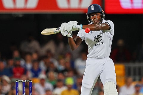 England's Jofra Archer plays a shot during the second Ashes cricket test match between Australia and England in Brisbane.