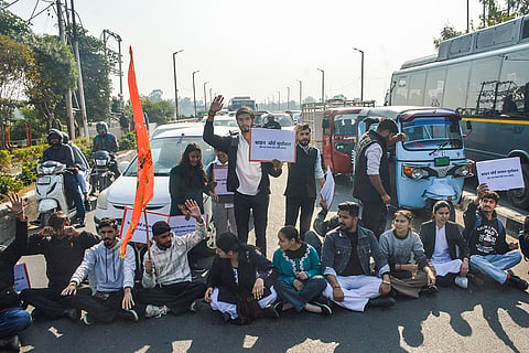 Members of Shri Mata Vaishno Devi Shrine Board Sangharsh Samiti and others block a road as they stage a protest against the alleged grant of majority seats in MBBS to Muslim students, mostly from Kashmir, at Shri Mata Vaishno Devi Institute of Medical Excellence, at Tawi bridge, in Jammu.