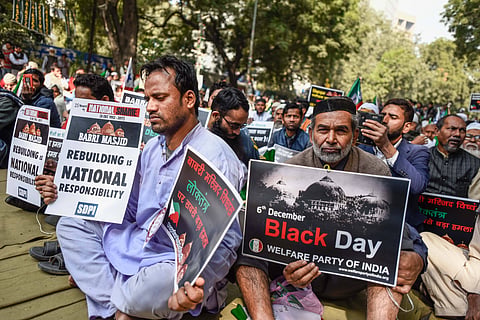 People participate in a protest march held under the banner of Lok Raj Sangathan on the 25th anniversary of Babri Mosque Demolition from Mandi House to Parliament Street, on December 6, 2017 in New Delhi, India.