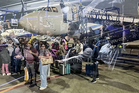 An IndiGo flight from Raipur lands at Chhatrapati Shivaji Maharaj International Airport's Terminal 2, in Mumbai. Passengers were left stranded as IndiGo cancelled numerous flights while struggling to meet new crew rostering rules, a day after it scrapped several services and announced schedule adjustments.