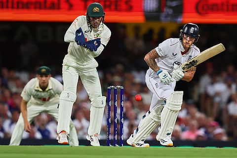 England's captain Ben Stokes plays a shot during the second Ashes cricket test match between Australia and England in Brisbane.