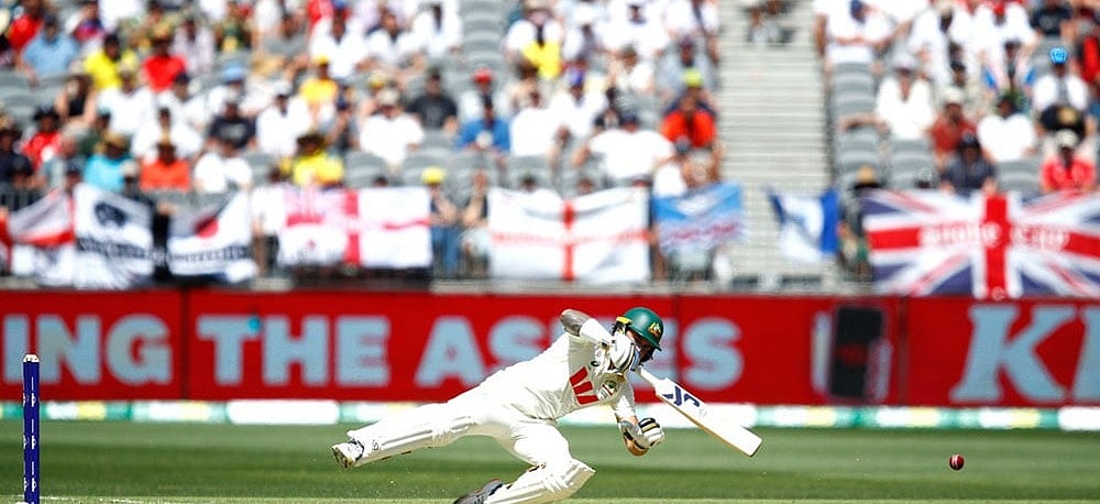 | Photo: AP/Gary Day : Australia's Jake Weatherald loses his balance as he gets out lbw during the first Ashes cricket test match between Australia and England in Perth.
