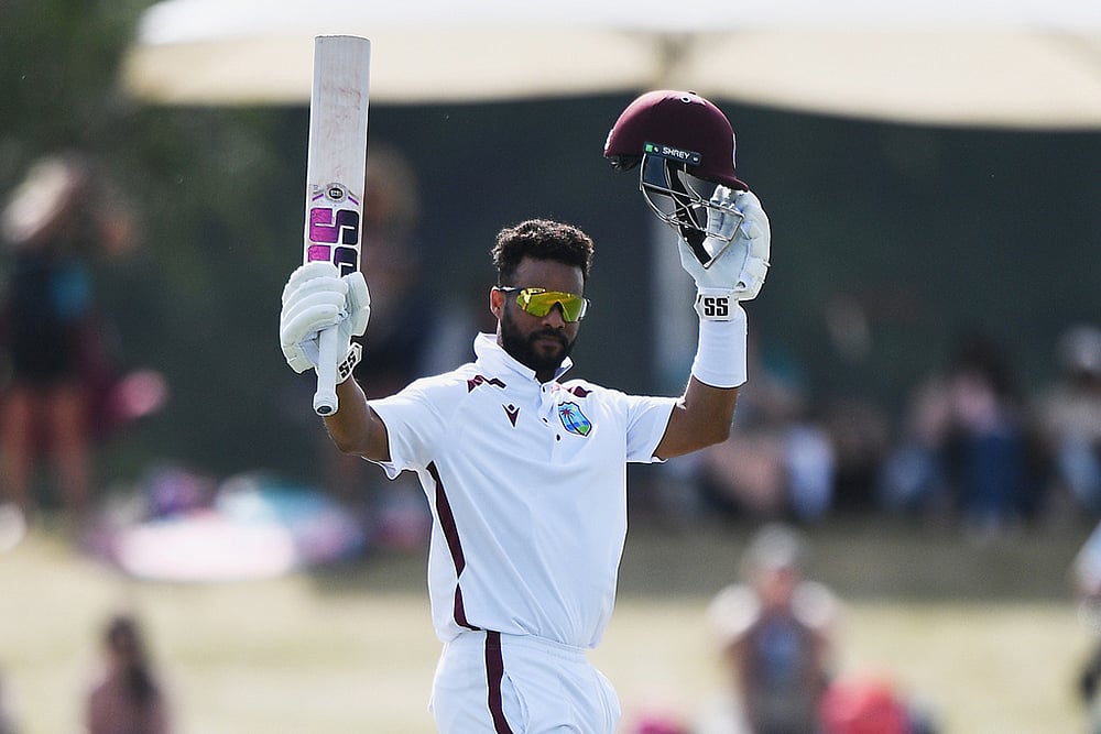| Photo: Chris Symes/Photosport via AP : West Indies' Shai Hope celebrates scoring 100 runs against New Zealand on Day 4 of their cricket test match in Christchurch, New Zealand.