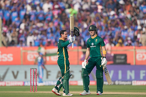 South Africa's Quinton de Kock celebrates his century during the third One Day International cricket match between India and South Africa in Visakhapatnam.