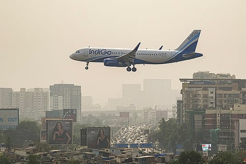 An IndiGo aircraft prepares to land at an airport, in Mumbai.