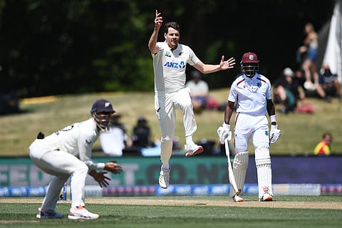 New Zealand's Jacob Duffy, center, celebrates the wicket of West Indies player Shai Hope on Day 5 of their cricket test match in Christchurch, New Zealand.