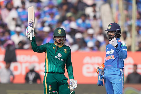 South Africa's Quinton de Kock celebrates his fifty runs during the third One Day International cricket match between India and South Africa in Visakhapatnam.
