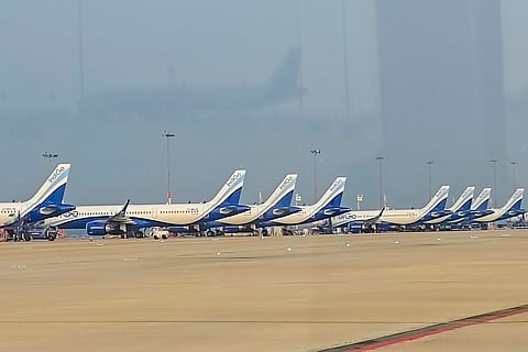 IndiGo aircrafts stationed at Kempegowda International Airport amid the airline's flight disruptions, in Bengaluru.