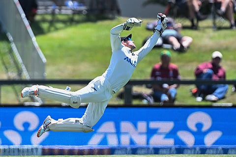 New Zealand's Tom Latham catches out the West Indies' Shai Hope on Day 5 of their cricket test match in Christchurch, New Zealand.