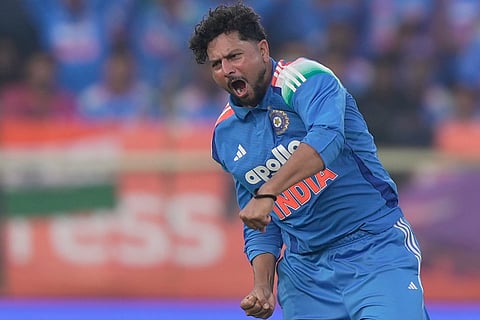 India's Kuldeep Yadav celebrates the wicket of South Africa's Marco Jansen during the third One Day International cricket match between India and South Africa in Visakhapatnam.