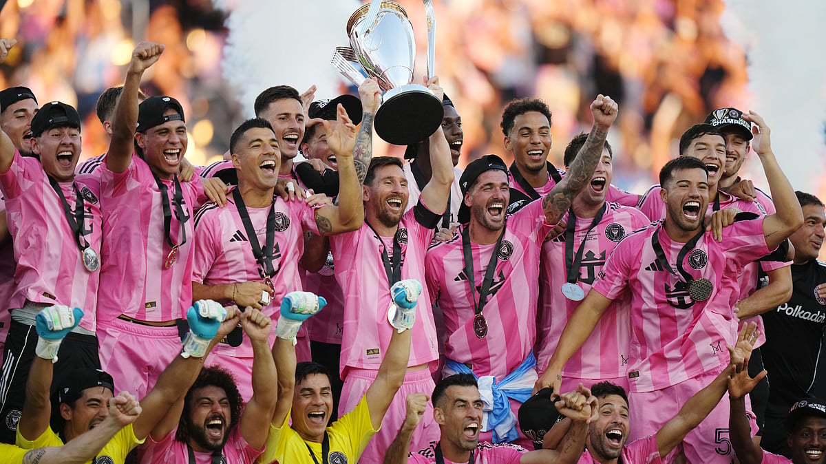 | Photo: The Canadian Press/Darryl Dyck via AP : Inter Miami's Lionel Messi hoists the trophy alongside teammates after defeating the Vancouver Whitecaps in the MLS Cup final match on December 6, 2025.