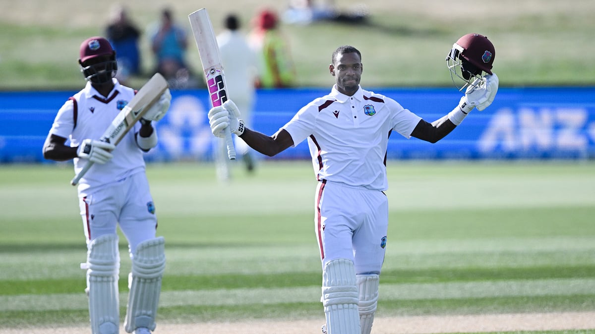 Andrew Cornaga/Photosport via AP : Justin Greaves (R) and Kemar Roach (L) stitched a vital partnership to help West Indies snatch a memorable draw.
