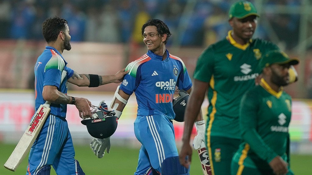 AP : Virat Kohli, left, and Yashasvi Jaiswal celebrate after India win the third ODI against South Africa in Visakhapatnam.