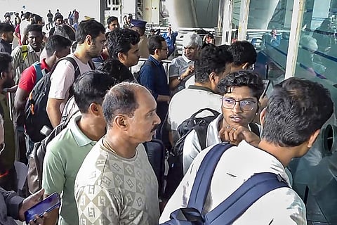 Passengers at an IndiGo airline's counter at the airport, in Chennai, Tamil Nadu. Air travel across India remained in chaos on Friday as IndiGo, the country's largest airline, scrapped several hundred flights, leaving thousands of passengers stranded for several hours at a stretch with little clarity on alternatives. 