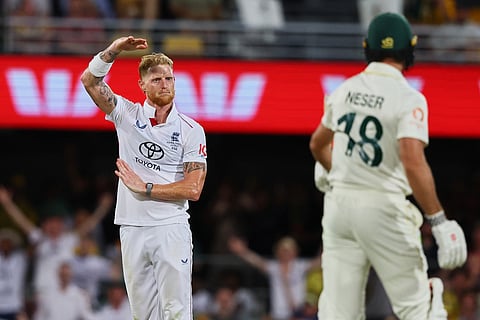 England's captain Ben Stokes looks at Australia's Michael Neser after bowls a delivery during the second Ashes cricket test match between Australia and England in Brisbane.