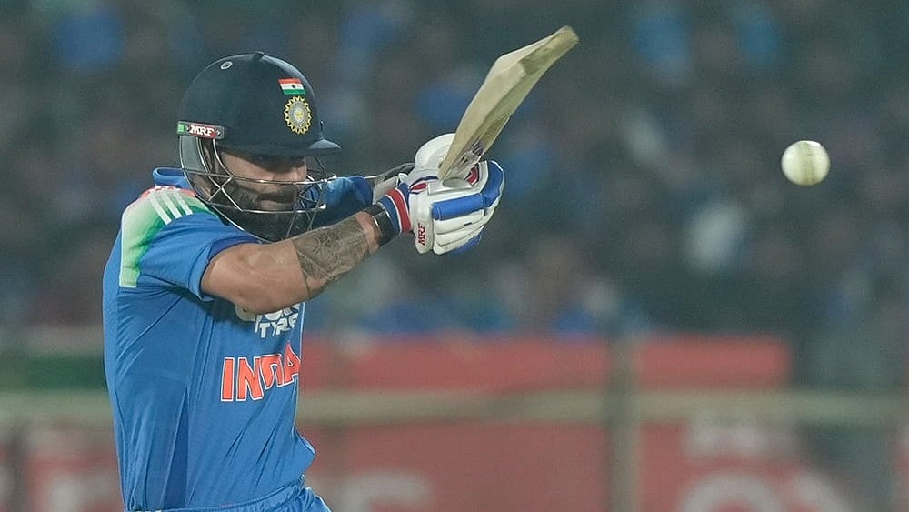 | Photo: AP/Mahesh Kumar A. : India's Virat Kohli plays a shot during the third One Day International cricket match between India and South Africa in Visakhapatnam.