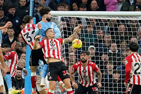 Manchester City's Josko Gvardiol, second left, scores his side's second goal during the English Premier League soccer match between Manchester City and Sunderland in Manchester, England.