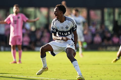Vancouver Whitecaps midfielder Ali Ahmed (22) reacts after scoring a goal during the second half of the MLS Cup final soccer match against the Inter Miami in Fort Lauderdale, Fla.