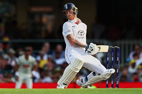 England's captain Ben Stokes avoids a bouncer during the second Ashes cricket test match between Australia and England in Brisbane.