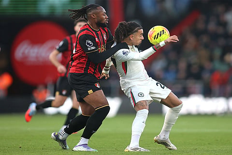 Bournemouth's Antoine Semenyo, left, and Chelsea's Malo Gusto in action during the English Premier League soccer match between Bournemouth and Chelsea in Bournemouth, England.
