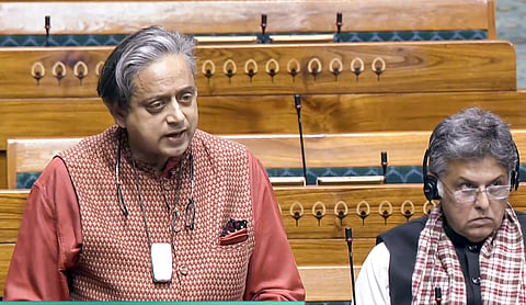 Congress MP Shashi Tharoor speaks in the Lok Sabha during the Winter session of Parliament, in New Delhi, Thursday, Dec. 4, 2025.