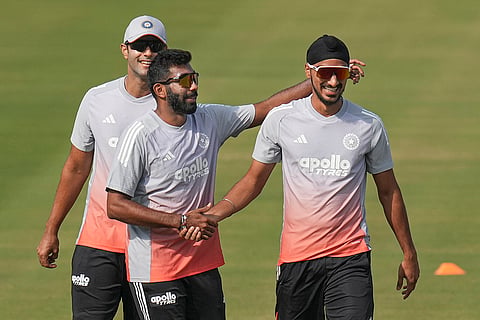 India's Jasprit Bumrah, center, Arshdeep Singh, right, and Shivam Dube during a practice session on the eve of the first T20 cricket match of a series between India and South Africa, at Barabati Stadium, in Cuttack, Odisha.