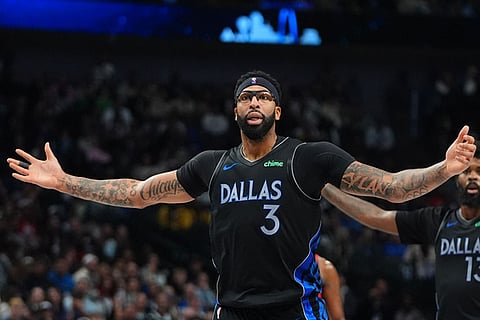 Dallas Mavericks forward Anthony Davis (3) reacts to a call during the second half of an NBA basketball game against the Houston Rockets in Dallas.
