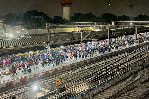 Passengers throng at the Lucknow railway station in the wake of the Indigo Flight disruptions, in Lucknow.