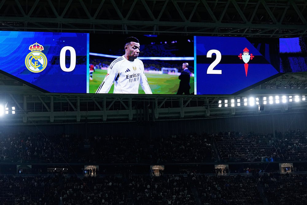 | Photo: AP/Manu Fernandez : A screen shows the score and Real Madrid's Kylian Mbappe leaving the field at the end of the Spanish La Liga soccer match between Real Madrid and Celta Vigo in Madrid, Spain.