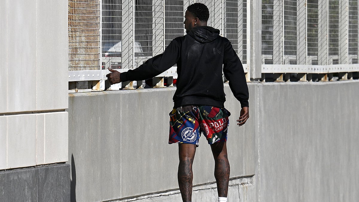 | Photo: AP/Phelan M. Ebenhack : File photo of Miami Heat guard Terry Rozier leaving the U.S. Federal Courthouse through a side door after his arraignment on October 23, 2025.