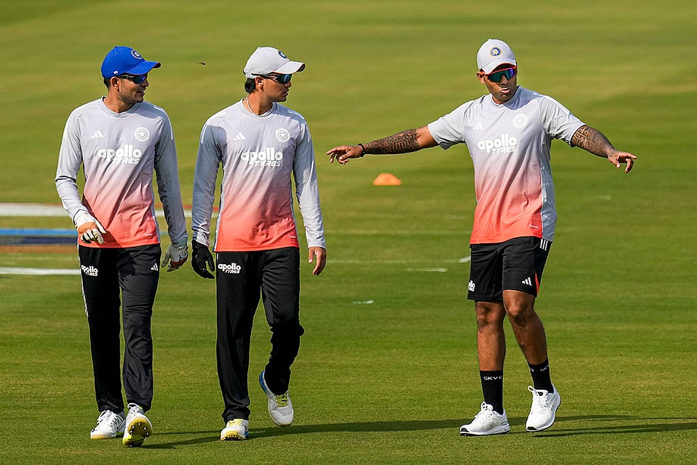 | Photo: PTI/Shailendra Bhojak : India’s captain Suryakumar Yadav, right, with Shubman Gill, left, and Abhishek Sharma during a training session on the eve of the first T20 cricket match of a series between India and South Africa, at Barabati Stadium, in Cuttack, Odisha.