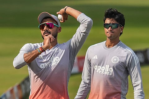 India’s Axar Patel, left, and Abhishek Sharma during a practice session on the eve of the first T20 cricket match of a series between India and South Africa, at Barabati Stadium, in Cuttack, Odisha.