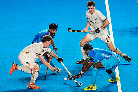 Players of Germany (white) and India vie for the ball during the semi-final match of the FIH Hockey Men’s Junior World Cup 2025, at Mayor Radhakrishnan Hockey Stadium in Chennai.