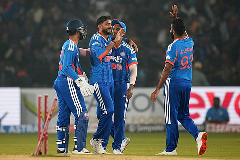 India's Axar Patel, centre, celebrates the wicket of South Africa's captain Aiden Markram during the first T20 International cricket match between India and South Africa in Cuttack.
