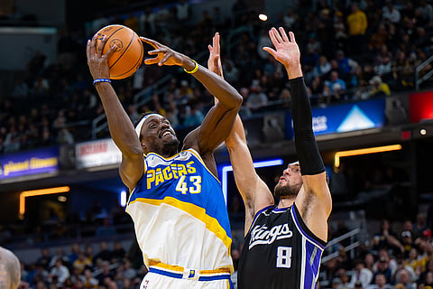 Indiana Pacers forward Pascal Siakam (43) shoots while being defended by Sacramento Kings guard Zach Lavine (8) during the second half of an NBA basketball game in Indianapolis.