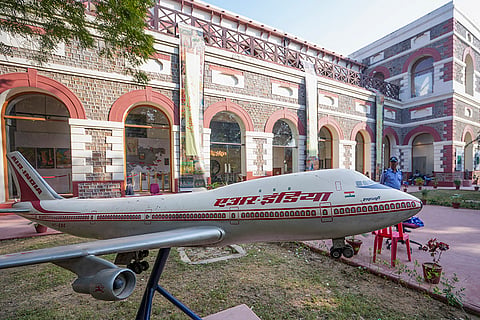 An old model of Air India plane on display in front of a British-era barrack housing, a new gallery put up by the Ministry of Culture, at Red Fort in New Delhi.