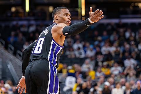 Sacramento Kings guard Russell Westbrook reacts after scoring during the first half of an NBA basketball game against the Indiana Pacers in Indianapolis.