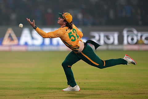 South Africa's Dewal Brevis drops a catch during the first T20 International cricket match between India and South Africa in Cuttack.