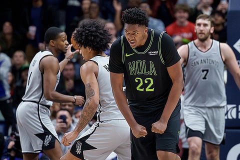 New Orleans Pelicans center Derik Queen (22) reacts after a score during the fourth quarter of an NBA basketball game against the San Antonio Spurs in New Orleans.