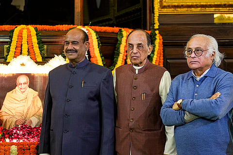 Lok Sabha Speaker Om Birla, left, Congress MP Jairam Ramesh, right, BJP leader Subramanian Swamy at Samvidhan Sadan to pay tribute to former Home Minister C Rajagopalachari on his birth anniversary, in New Delhi.