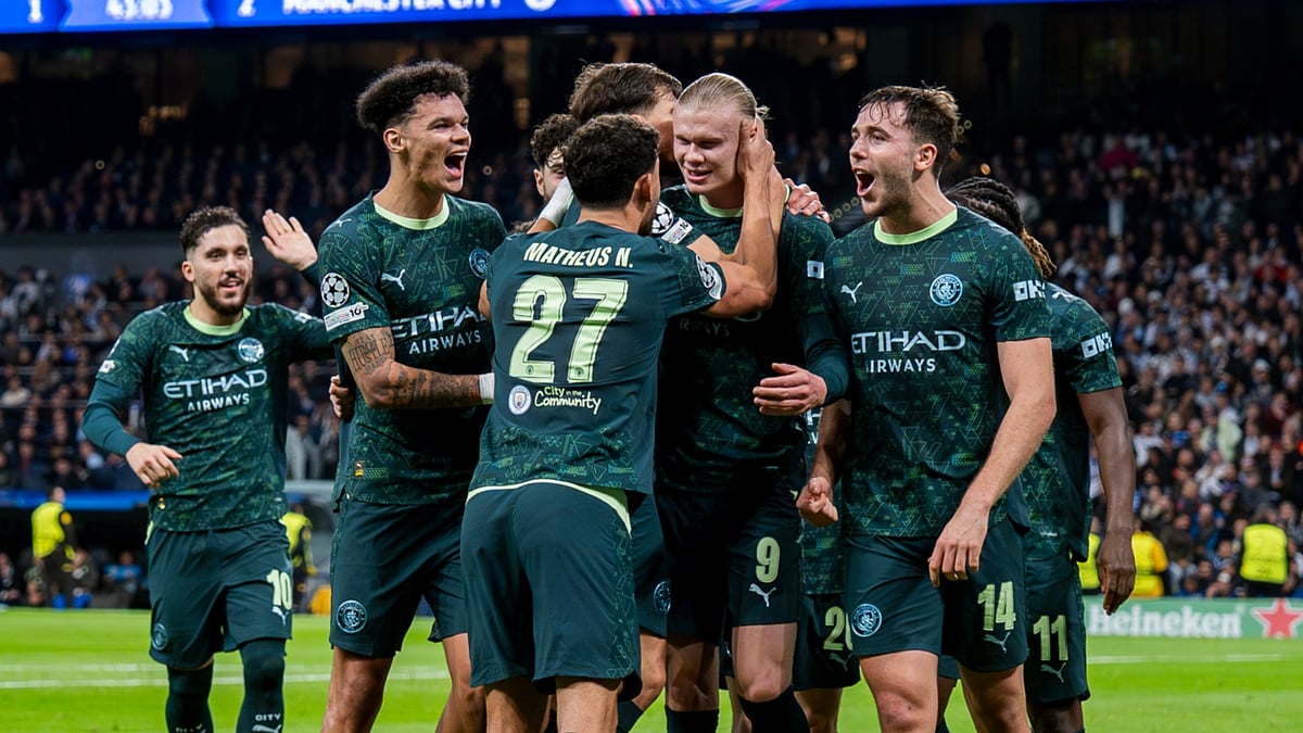 Manchester City's Erling Haaland celebrates after scoring his side's second goal during the UEFA Champions League match against Real Madrid.