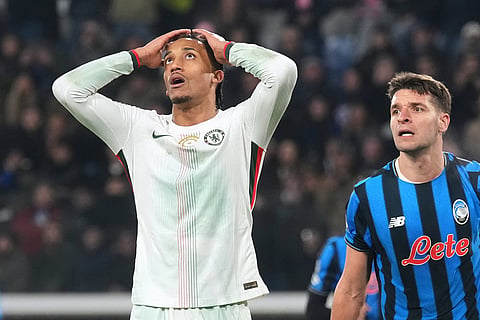 Chelsea's Joao Pedro reacts after a missed chance to score during the Champions League opening phase soccer match between Atalanta and Chelsea, in Bergamo, Italy.
