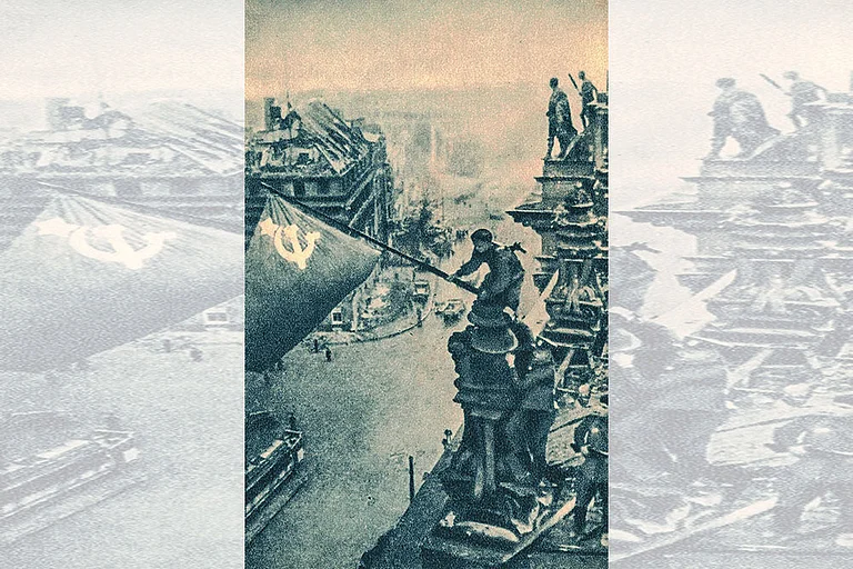 Flying High: Two Soviet soldiers plant a Soviet flag on top of the Reichstag building on May 2, 1945,
symbolising the Soviet Union’s victory over Nazi Germany during the Battle of Berlin - | Photo: Imago